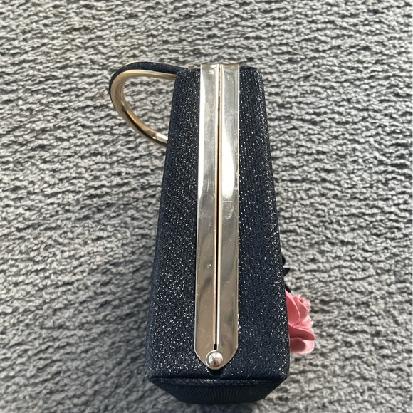 EUC BLACK SPARKLY HANDBAG WITH FLORAL ARRAY ON FRONT. Clasp has crystals. - Picture 2 of 8